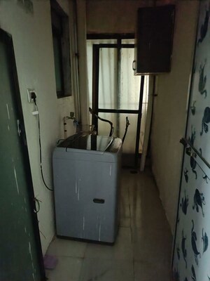 Kitchen in 2 BHK Apartment at Tharwani Rosewood Heights, Kharghar Sector 10 – for Rent