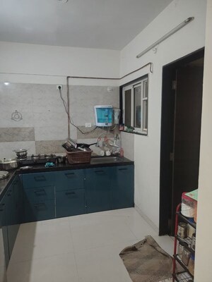 Kitchen in 2.5 BHK Apartment at Rahatani – for Sale