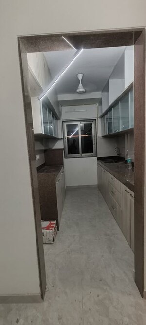 Kitchen in 2 BHK Apartment at Paranjape Schemes Royal Court, Andheri East – for Rent