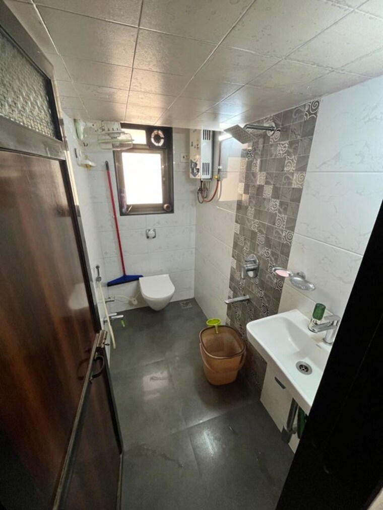Bathroom, dahisar-bhushan 2 Bedroom 704 Sq.Ft. Apartment In Dahisar West Mumbai 10395866