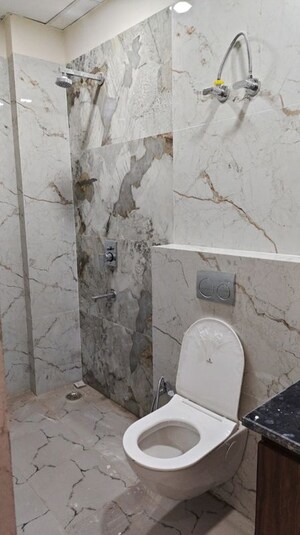 Bathroom in 3 BHK Builder Floor at Mahindra Enclave – for Sale