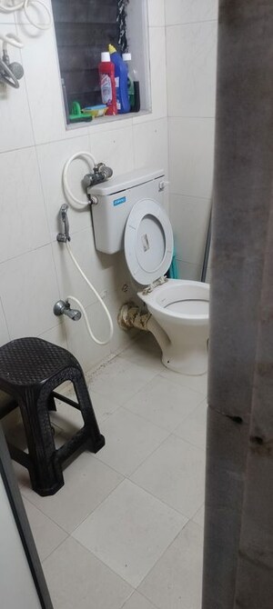 Bathroom in 1 BHK Apartment at Queens Land Apartment, Andheri West – for Sale