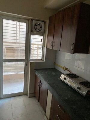 Kitchen in 2 BHK Apartment at Radhey Krishna Casa Green I, Sector 16 Greater Noida – for Sale