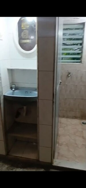 Bathroom in 1 BHK Apartment at Kishor Darshan Apartment, Andheri West – for Rent