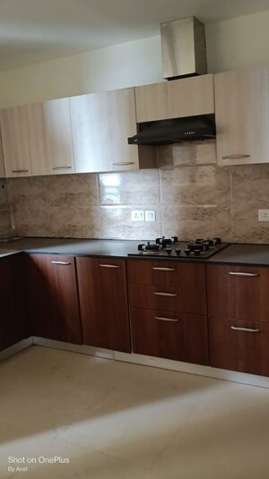 Kitchen in 3 BHK Apartment at Wave Amore, Sector 32 – for Rent