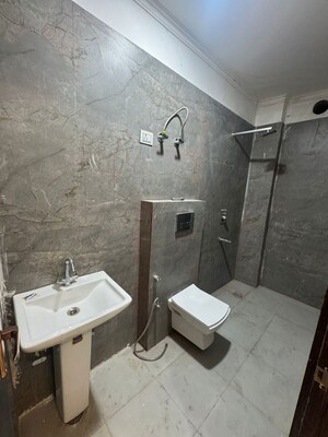 Bathroom in 1 BHK Apartment at Sainik Farm – for Rent