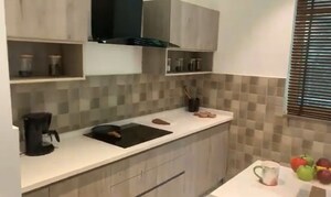 Kitchen in 2 BHK Apartment at Godrej Palm Retreat, Sector 150 – for Sale