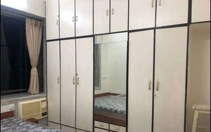 Building Lobby in 2 BHK Apartment at Ador House, Fort – for Rent