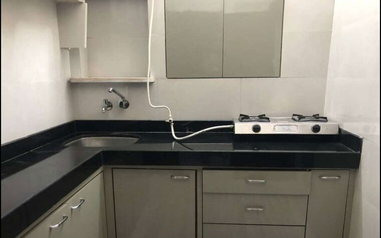 Kitchen, ador-house 2 Bedroom 750 Sq.Ft. Apartment In Fort Mumbai 10485563