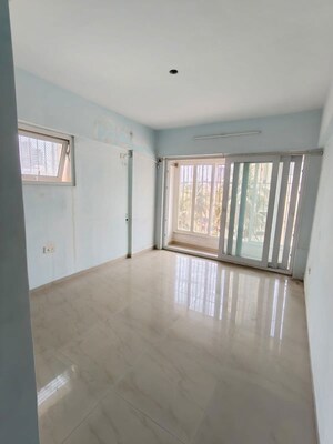 Room in 2 BHK Apartment at Landmark Building, Worli – for Rent