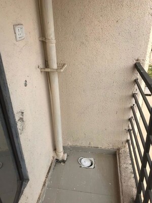 Balcony in 1 BHK Apartment at Shreenath Parasnath Garden, Umroli – for Sale