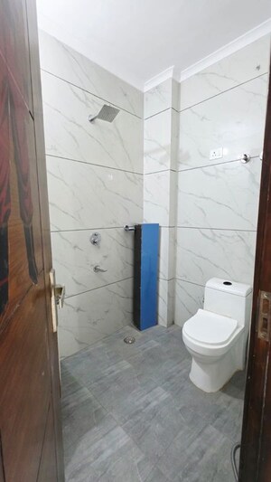 Bathroom in 4 BHK Builder Floor at Freedom Fighters Enclave – for Sale