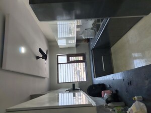 Kitchen in 3 BHK Builder Floor at Sector 11 – for Sale