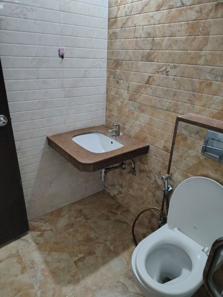 Bathroom, abhinav-pebbles-urbania 1 Bedroom 560 Sq.Ft. Apartment In Bavdhan Pune 10485717