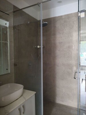 Bathroom in 3 BHK Apartment at Rohini Sector 9 – for Rent