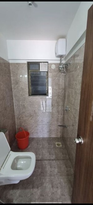 Bathroom in 1 BHK Apartment at Parinee Essence, Kandivali West – for Rent