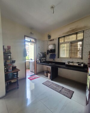 Kitchen in 2 BHK Apartment at Malpani The Crest, Pimple Saudagar – for Sale