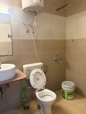 Bathroom in 3 BHK Apartment at Hope Apartments, Sector 15 – for Rent