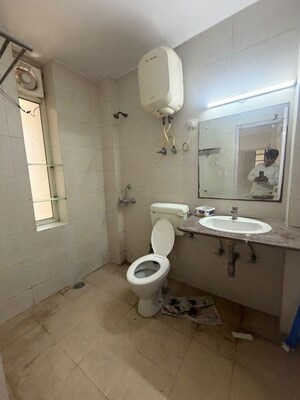 Bathroom in 3 BHK Apartment at Hope Apartments, Sector 15 – for Rent
