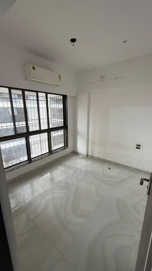 Living Room in 1 BHK Apartment at Universal Cubical, Jogeshwari West – for Rent