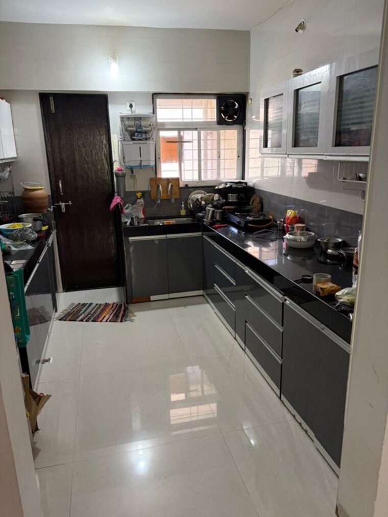 Kitchen, pratham-apartments-baner 2.5 Bedroom 1001 Sq.Ft. Apartment In Baner Pune 10486082