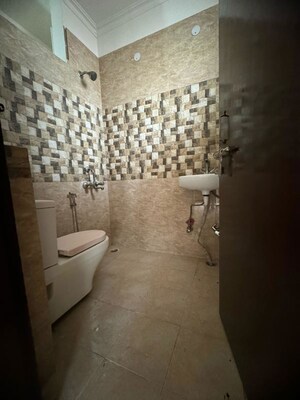 Bathroom in 2 BHK Builder Floor at Chattarpur – for Rent