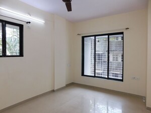 Bedroom in 3 BHK Apartment at Shivom Neela CHS, Mulund West – for Rent