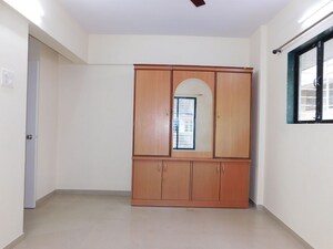 Bedroom in 3 BHK Apartment at Shivom Neela CHS, Mulund West – for Rent