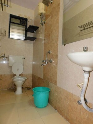 Bathroom in 3 BHK Apartment at Shivom Neela CHS, Mulund West – for Rent
