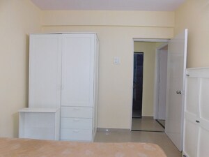 Bedroom in 3 BHK Apartment at Shivom Neela CHS, Mulund West – for Rent
