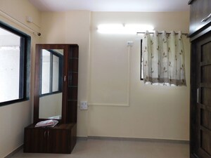 Bedroom in 3 BHK Apartment at Shivom Neela CHS, Mulund West – for Rent