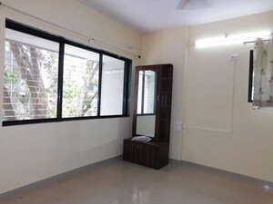 Bedroom in 3 BHK Apartment at Shivom Neela CHS, Mulund West – for Rent