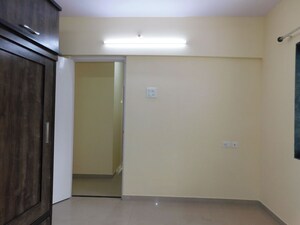 Bedroom in 3 BHK Apartment at Shivom Neela CHS, Mulund West – for Rent