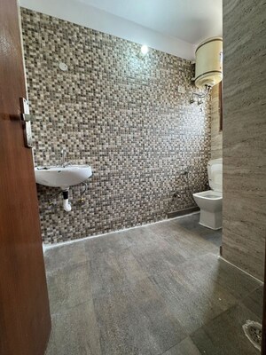 Bathroom in 2 BHK Builder Floor at Chattarpur – for Rent