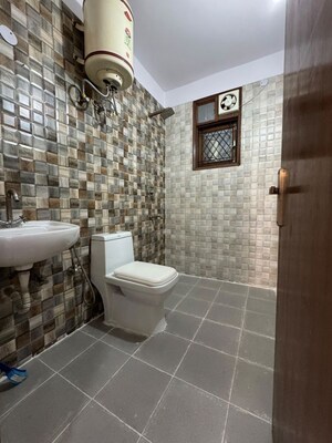 Bathroom in 2 BHK Builder Floor at Chattarpur – for Rent