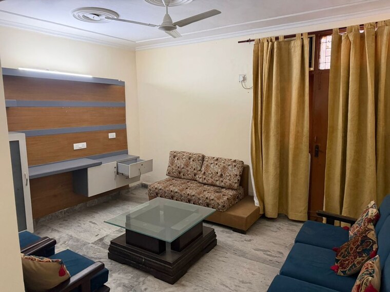 Living Room, aadarsh-niketan-society 1 RK 200 Sq.Yd. Builder Floor In Sector 62 A Noida Noida 10486241