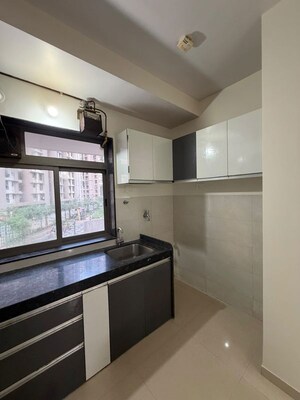 Kitchen in 2 BHK Apartment at Runwal Eirene, Balkum Pada – for Rent