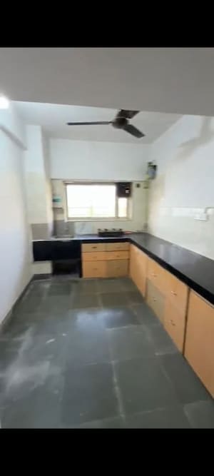 Kitchen in 2 BHK Apartment at Powai Cosmopolitan CHS, Powai – for Rent