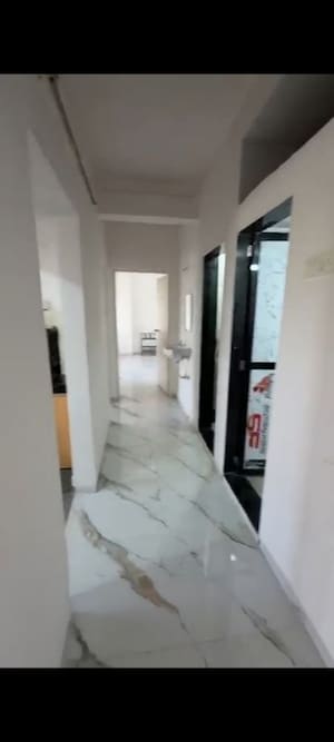 Building Lobby in 2 BHK Apartment at Powai Cosmopolitan CHS, Powai – for Rent