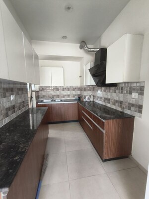 Kitchen in 3 BHK Apartment at Sushma Infinium, Ghazipur – for Rent