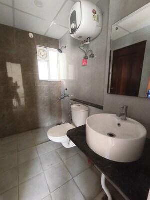Bathroom in 3 BHK Apartment at Sushma Infinium, Ghazipur – for Rent