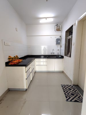 Kitchen in 2 BHK Apartment at Bramhacorp F Residences, Kalyani Nagar – for Rent