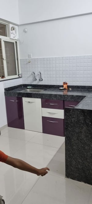 Kitchen in 2 BHK Apartment at Majestique Manhattan Phase 2, Wagholi – for Rent