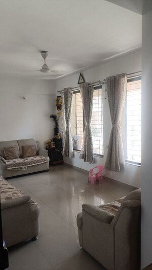 Living Room in 2 BHK Apartment at Gulmohar Renaissance, Wagholi – for Rent