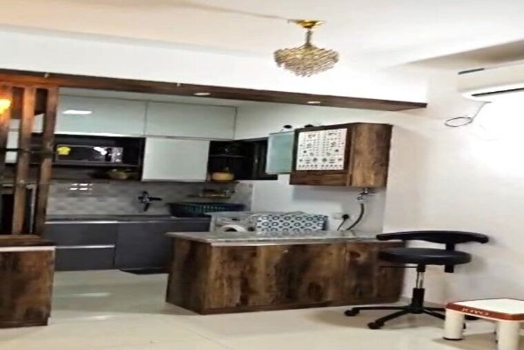 Kitchen, alcon-rethos-apartment 2 Bedroom 900 Sq.Ft. Apartment In Kharadi Pune 10485701