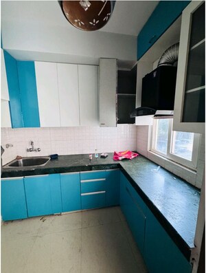 Kitchen in 2 BHK Apartment at Shree Vardhman Green Court, Sector 90 – for Sale