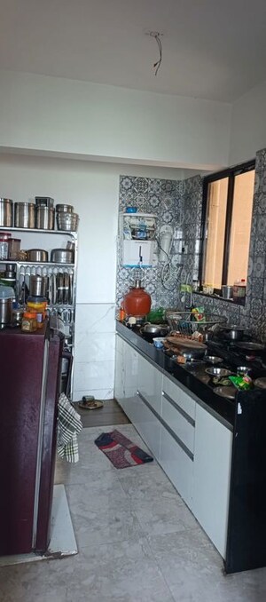 Kitchen in 2 BHK Apartment at Nexus Kinaara, Chikhali – for Rent