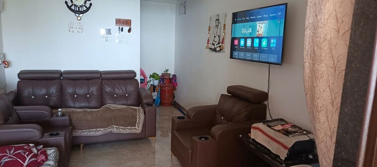 Living Room, nexus-kinaara 2 Bedroom 650 Sq.Ft. Apartment In Chikhali Pune 10486664