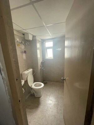 Bathroom in 1 BHK Apartment at Advitya Plaza, Sector 143 – for Sale