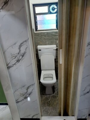 Bathroom in 1 BHK Apartment at Nagari Niwara CHS, Goregaon East – for Rent